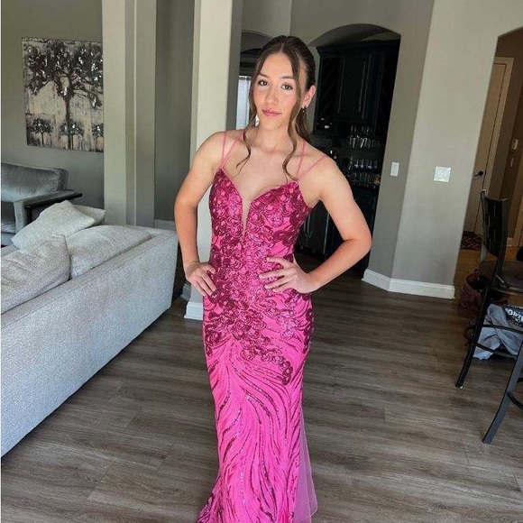 A prom dress in a size 4 with slight alterations. - Picture 1 of 2